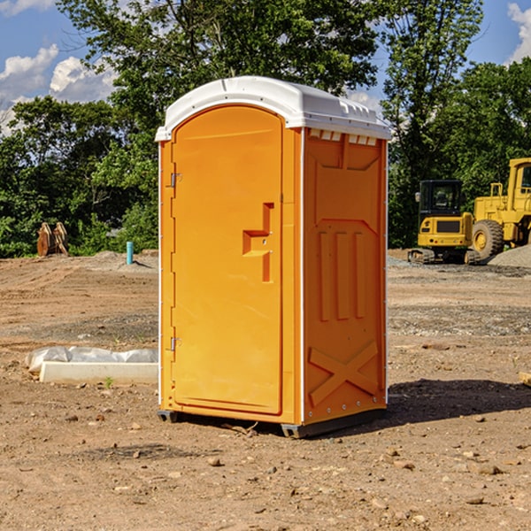 how often are the portable restrooms cleaned and serviced during a rental period in Troy Mills IA